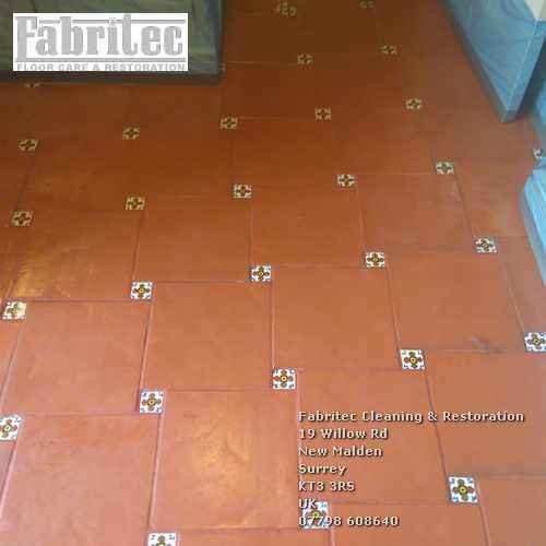 Unsightly Sealer And Polish Deposits On Terracotta tile floor in Woking