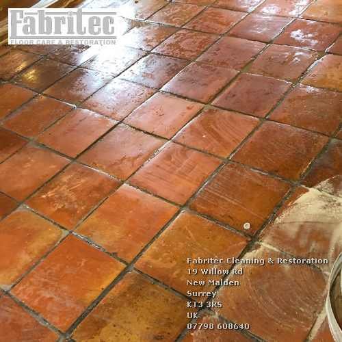 Unattractive Sealer And Polish Deposits On Terracotta tile floor in Wimbledon