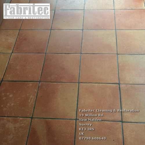 Unattractive Sealer And Polish Deposits On Terracotta tile floor in Ashtead