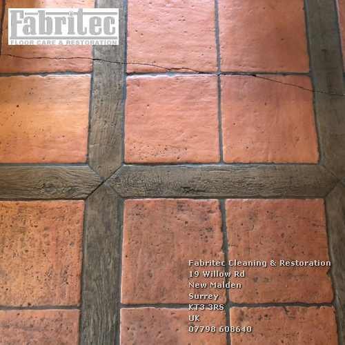 Unpleasant Sealer And Polish Deposits On Terracotta tile floor in West Byfleet